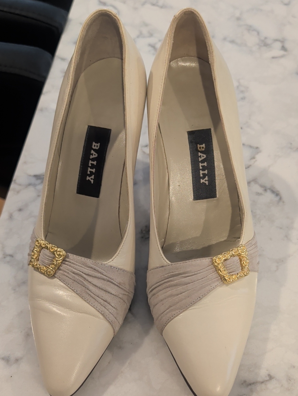 Bally Ivory Leather Pointed-Toe Pumps with Gold Buckle Accent